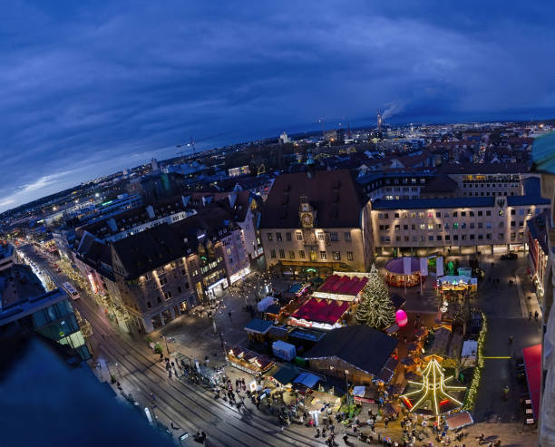 Aerial view at the Christmas market, the town hall and Kätchenhaus at the market square of Heilbronn, Baden-Wurttemberg, Germany. Beautiful cloudy sky at the blue hour. heilbronn stock pictures, royalty-free photos & images