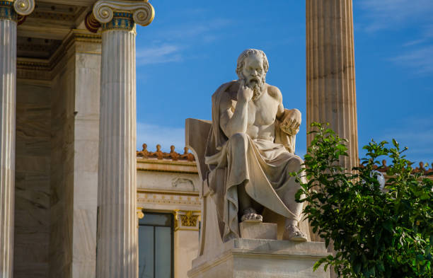 istock Ancient statue of the great Greek philosopher Socrates on background of classical columns. 897023474