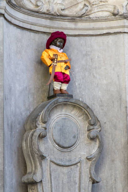 Manneken Pis Statue in Brussels Bronze fountain sculpture of the Manneken Pis in Brussels, Belgium manneken pis statue in brussels belgium stock pictures, royalty-free photos & images