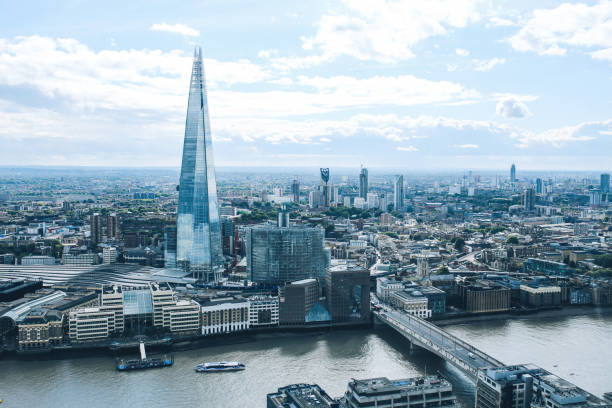 istock Panoramic image of London under the cloudy sky 897043360