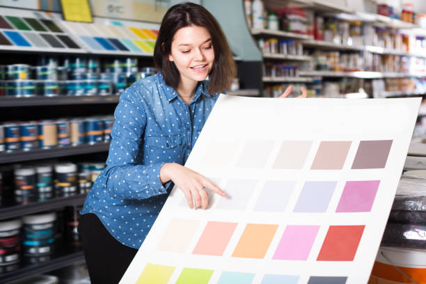 istock Adult woman checking color scheme 897060654