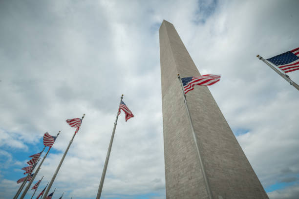 istock Washington Monument and American Flags in Washington, DC 897071070
