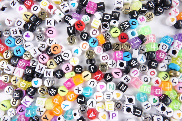 istock Full Frame Shot Of Colorful Alphabet Beads 897077096