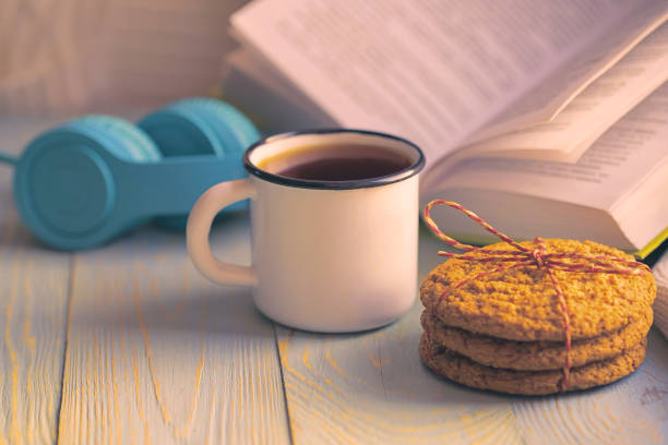 istock Winter holidays concept. Bookreading and music 897095584