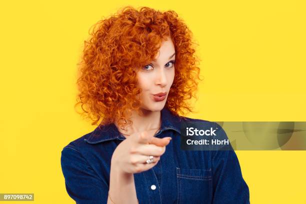 Its You Portrait Of A Beautiful Woman Redhead Curly 80s Retro Style Pointing At You Camera Happy Isolated Yellow Background Wall Body Language Gestures Psychology Stock Photo - Download Image Now