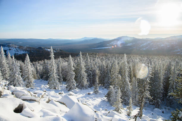 istock Winter landscape. Snowy forest at mountains, Russia, Ural. 897111132