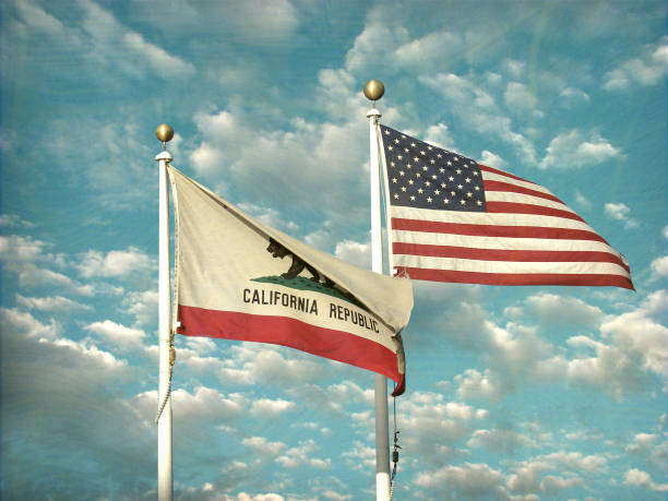 istock american and California state flags 897142350