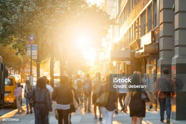 Crowd Of People Walking Down Sidewalk In New York City Stock Photo - Download Image Now