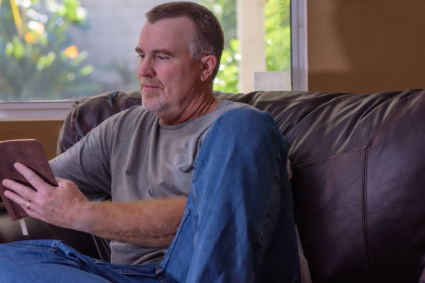 istock Reading on his favorite chair 897178200