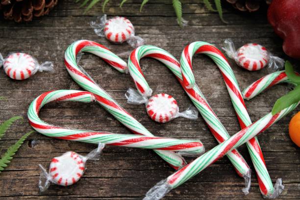 istock Christmas Home Decor:  Christmas decorations with candy canes and fruit 897186274