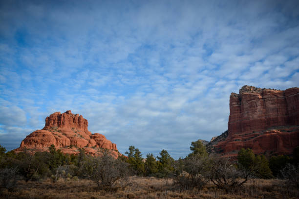Beautiful Mountains of Sedona Bell Rock, tourist attraction near Sedona, in sunset glow sunset cloudscape cloud arizona stock pictures, royalty-free photos & images