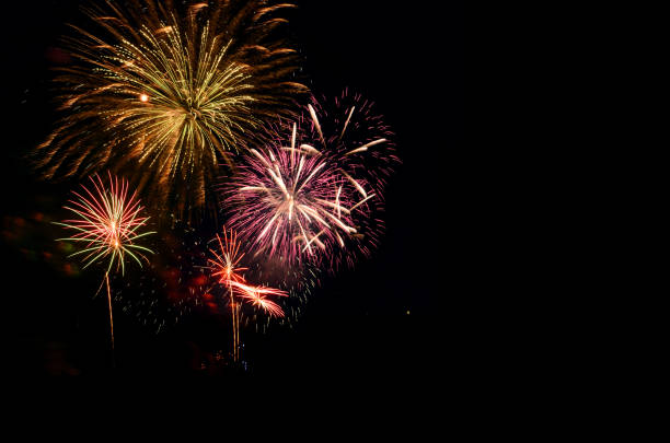 istock Colorful fireworks celebration and the city night light background. 897204618