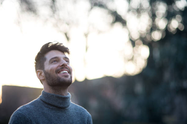 istock Portrait of an handsome smiling man 897207360