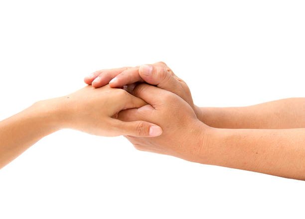 Loving couple holding hands on white background stock photo