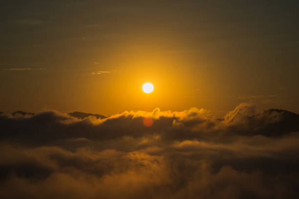 istock Fog and sun on the mountain view point 897215576