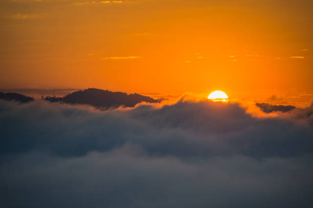 istock Fog and sun on the mountain view point 897220802