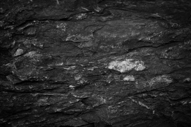 istock Dark grey black slate background or texture.Black slate background 897221260