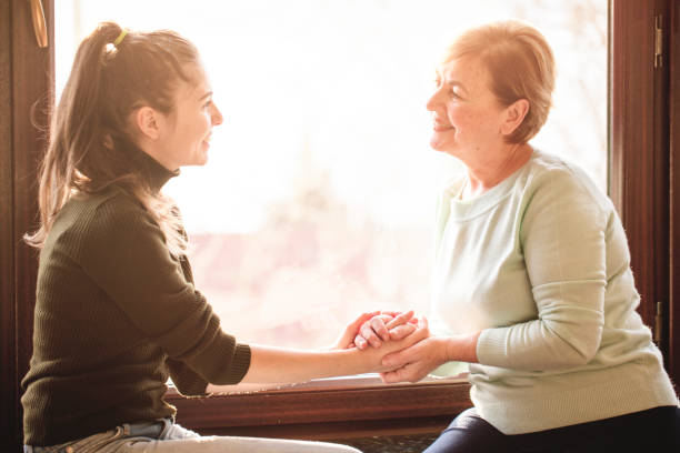 istock Smiling mother with young daughter 897221302