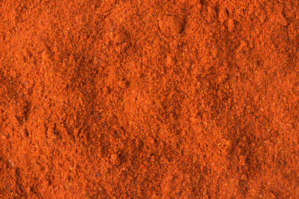 istock chili powder spice as a background, natural seasoning texture 897226160