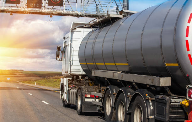 istock Gas-tank goes on highway against the sky 897226466