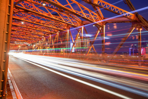 istock Shanghai Garden Bridge and light trails 897237686