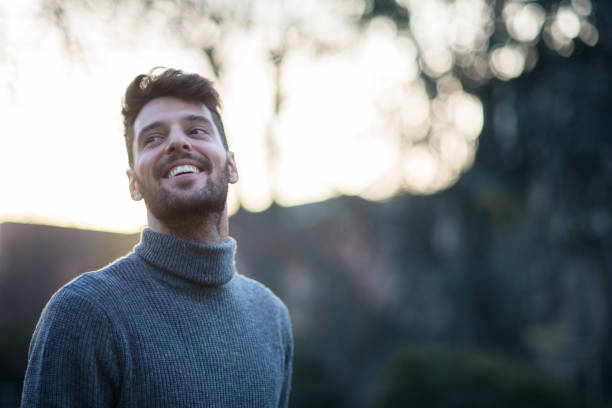 istock Portrait of an handsome smiling man 897240894