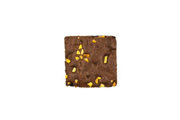 istock Chocolate brownie isolated on white background 897245452