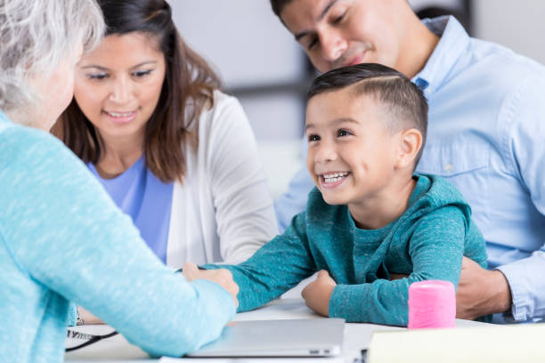 istock Nurse examines boy in community free clinic 897245574