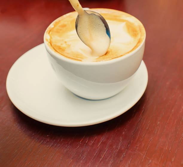 istock Macro mode image of coffee cup and foam 897253314