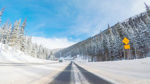 POV point of view - Driving over Berthoud Pass after winter storm in Colorado.