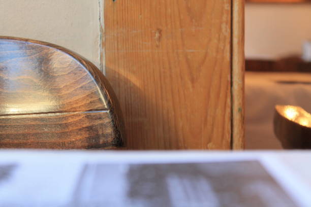 istock wood sitting at the table 897276838