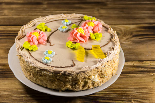 istock Kiev cake with cream, nuts and meringue 897279910