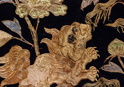 Vintage traditional japanese silk kimono Japan pattern gold dragon on decorative background.