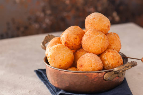 istock Small cottage cheese doughnuts (castgnole) in a vintage bowl. Festive dessert. 897303396