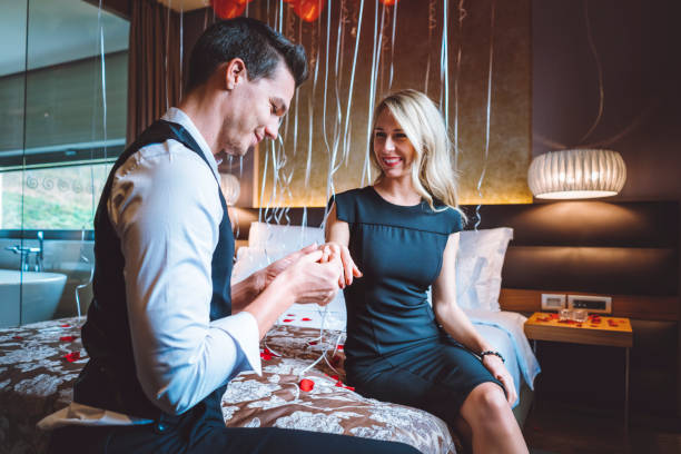 istock Surprise in a hotel room turned into a proposal 897312026