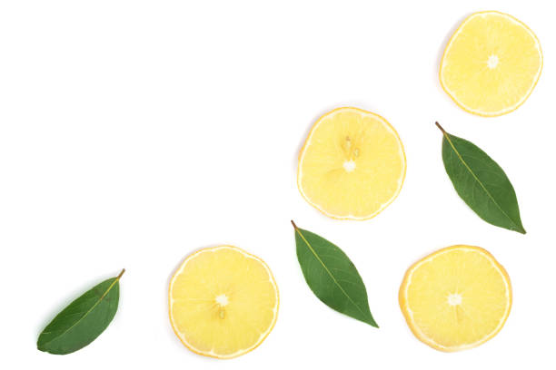istock Slices lemon with leaves isolated on white background with copy space for your text. Flat lay, top view 897312106