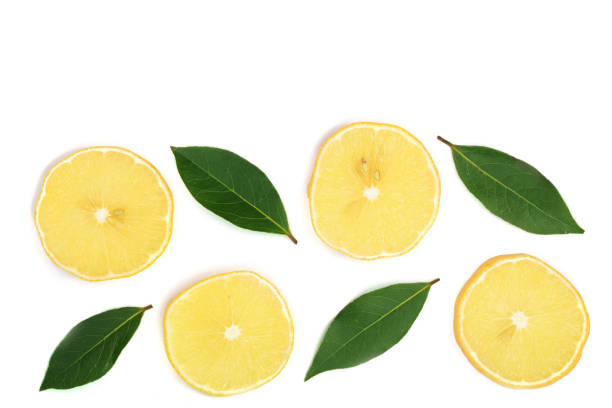 istock Slices lemon with leaves isolated on white background with copy space for your text. Flat lay, top view 897314230