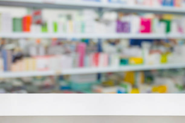 istock pharmacy drugstore shop interior blur background 897329806