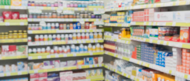 istock pharmacy drugstore shop interior blur background 897329808