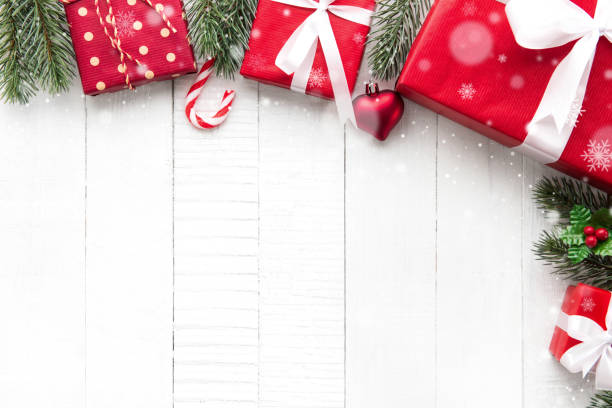 istock Colorful Christmas gift boxes on white wood background border design 897352806