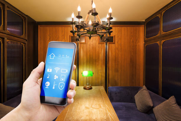 istock smart phone with smart home with modern cafe 897356210