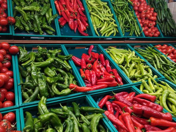 istock Green and Red Peppers at Supermarket 897356438