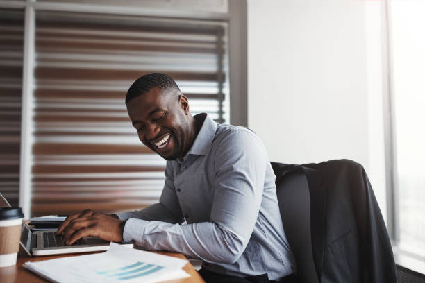 istock He's having a great time in the office 897359782