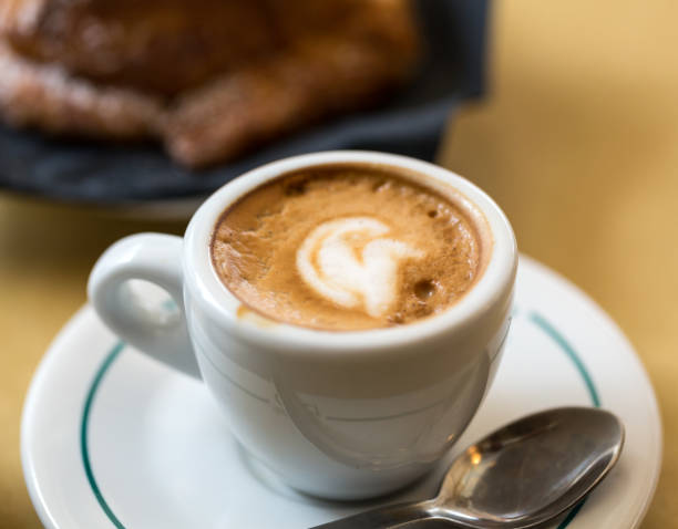 istock Cup of coffee on the table 897361840