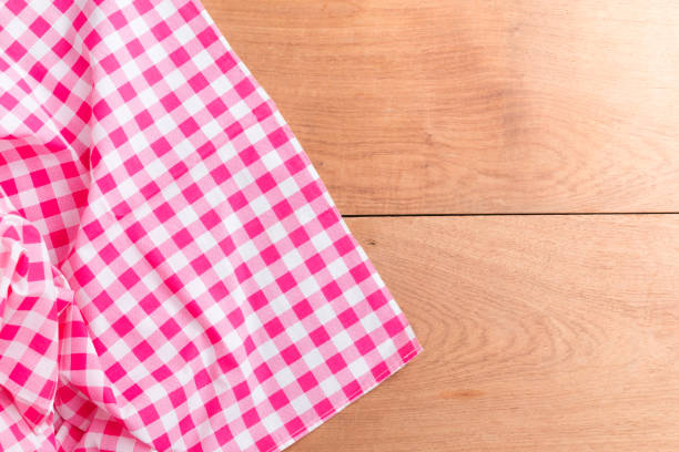 istock Tablecloths on the wooden table background 897371582