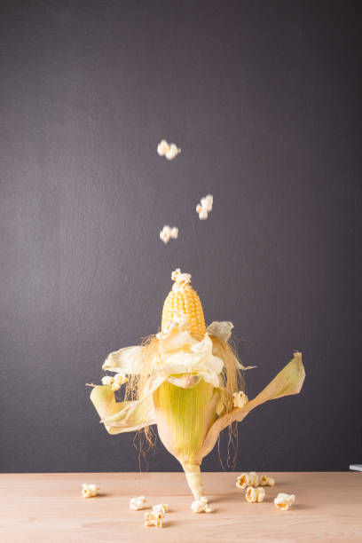 Fresh corn on cob on  wooden table, closeup
