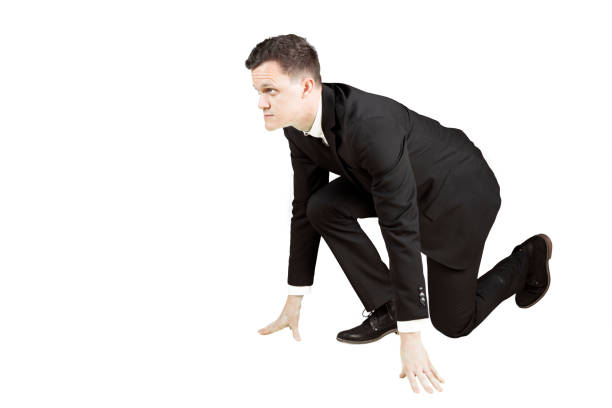 istock European businessman kneeling on studio 897372146