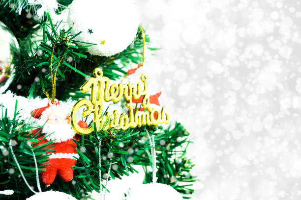 istock Tree and Christmas decorations. Beautiful decorated with present boxes in a winter landscape with snow. Can be used for background or wallpaper. 897376076
