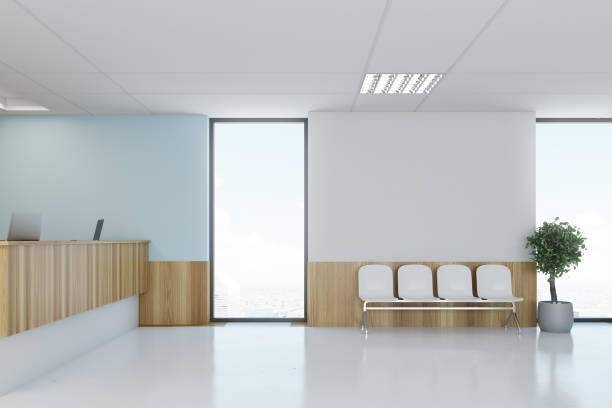 istock Blue and wooden hospital lobby, reception 897384808