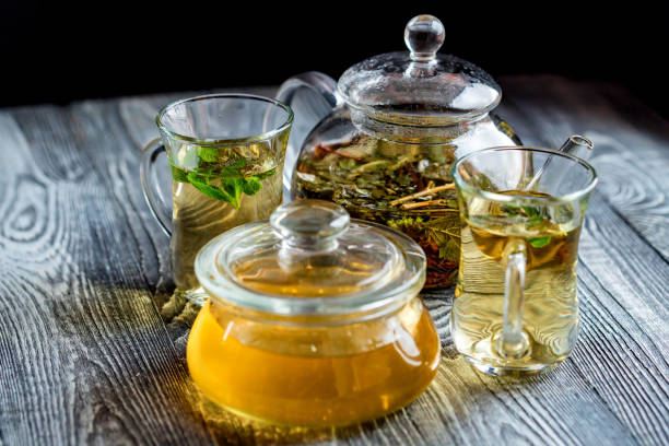 istock Herbal tea with honey and mint leaves 897385012